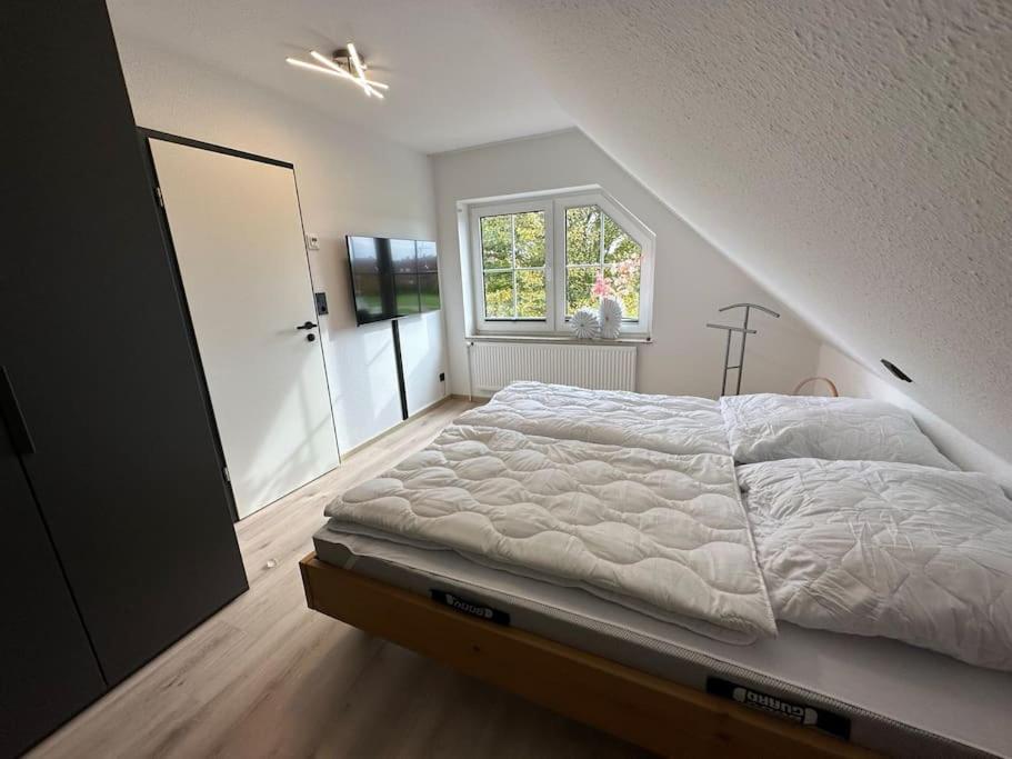 Haus Zuckersnuut Apartment Dornum Bagian luar foto